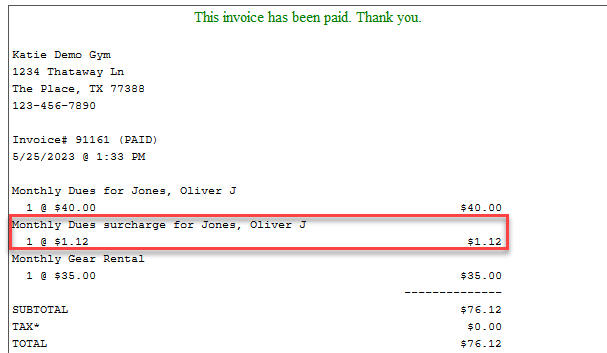 Paid invoice with surcharge highlighted.